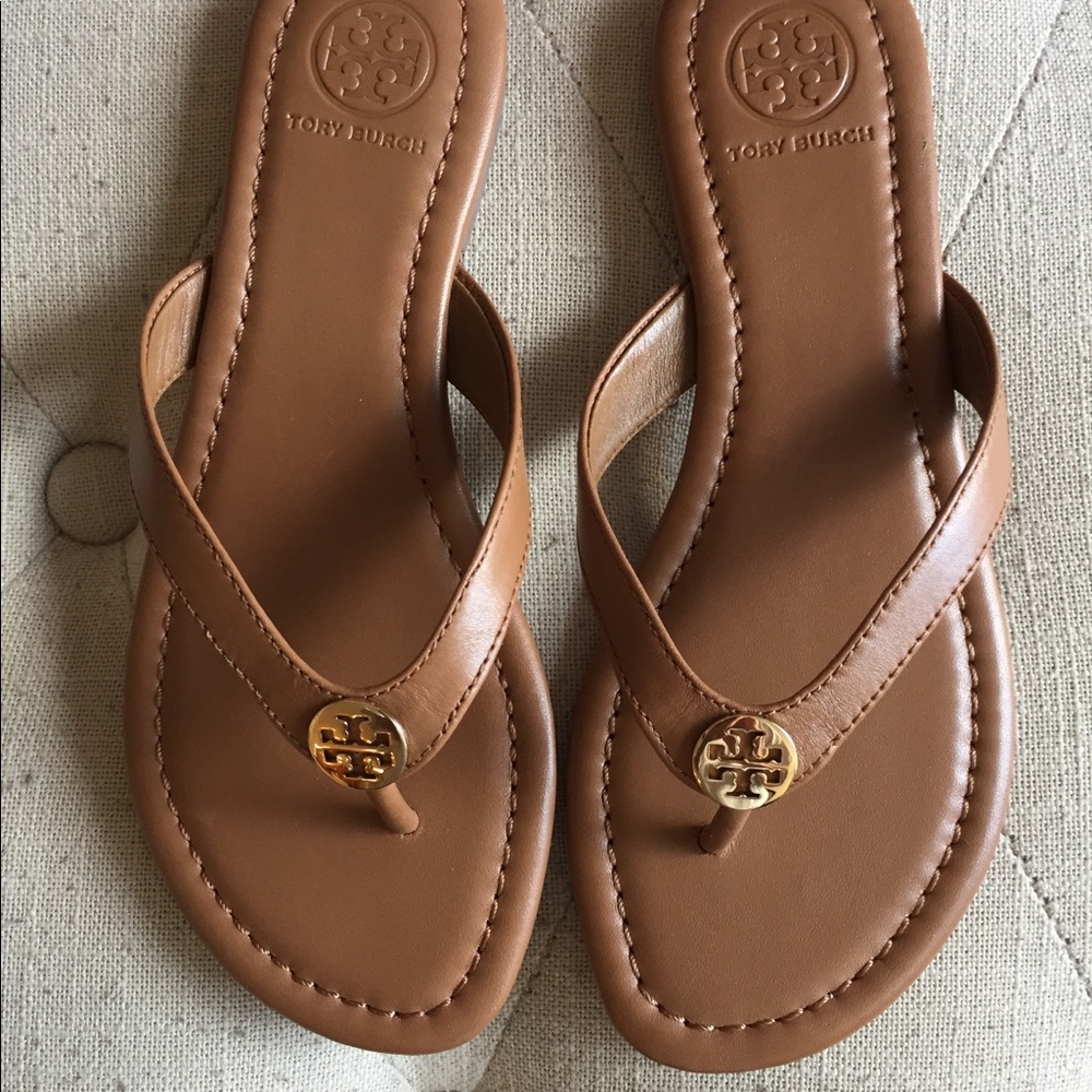 Authentic Tory Burch leather flip flop/sandals.